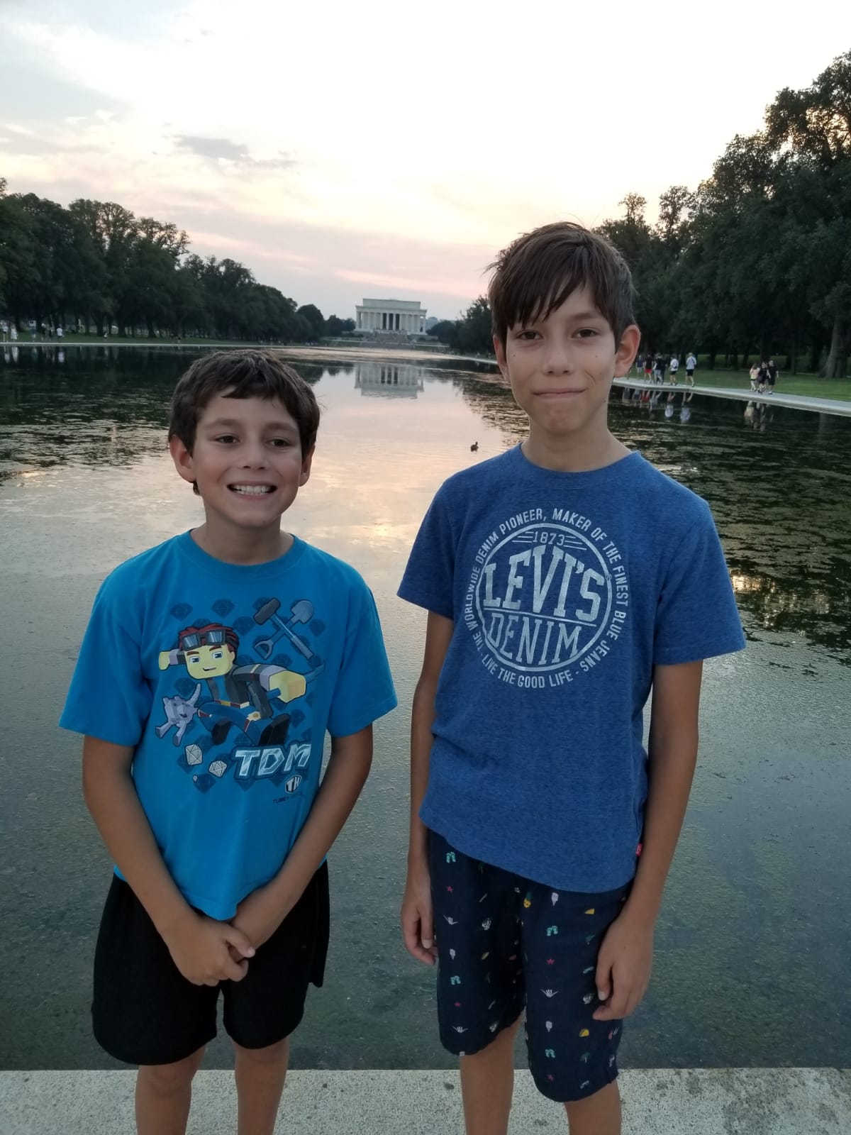 my brother and I in front of the reflecing pool